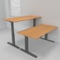 Preview: Doppelarbeitsplatz 163 x 160 cm HMK1 elektrisch höhenverstellbare Schreibtische Gestell Grafit Tischplatten Buche